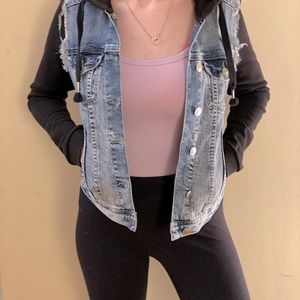 Hooded jean jacket with black sleeves